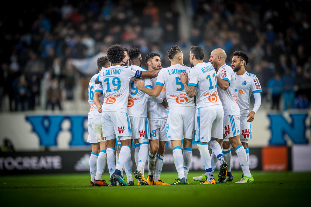 马赛欧冠征途：逆风中绽放的蓝色火焰